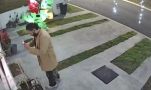 网友发现一男子在自家门前不停拍照，以为是小偷决定报警，结果...误会大了！
